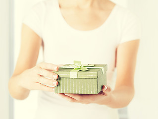 Image showing woman hands with gift box