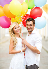 Image showing couple with colorful balloons