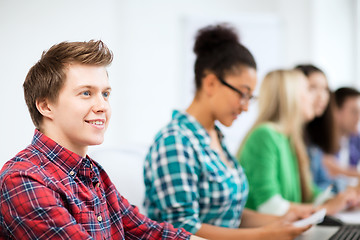 Image showing student with computer studying at school