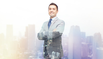 Image showing happy smiling businessman in suit