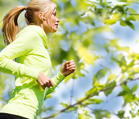 Image showing woman jogging outdoors