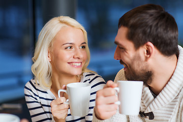 Image showing happy couple meeting and drinking tea or coffee