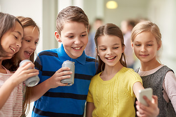 Image showing group of school kids with smartphone and soda cans