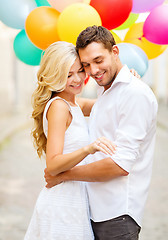 Image showing couple with colorful balloons