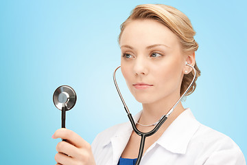 Image showing young female doctor with stethoscope