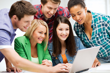 Image showing students looking at tablet pc in lecture at school