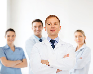 Image showing smiling male doctor in white coat