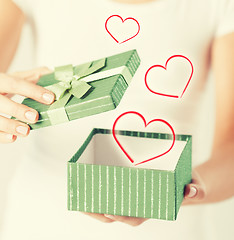 Image showing woman hands with gift box