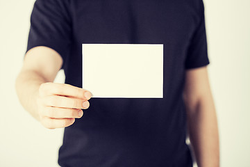 Image showing man hand with blank paper