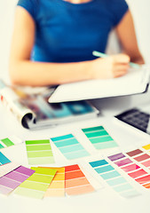 Image showing woman working with color samples for selection