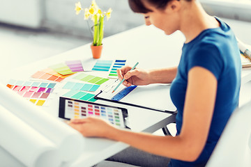 Image showing woman working with color samples for selection