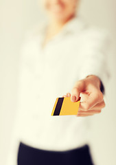 Image showing woman showing gold credit card