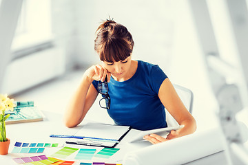 Image showing woman working with color samples for selection