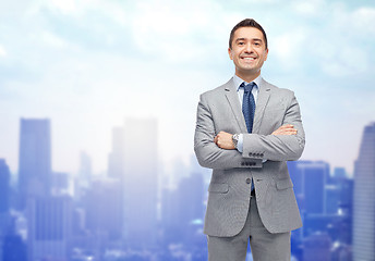 Image showing happy smiling businessman in suit