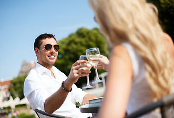 Image showing couple drinking wine in cafe