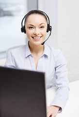 Image showing friendly female helpline operator