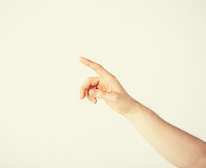 Image showing man hand pointing at something