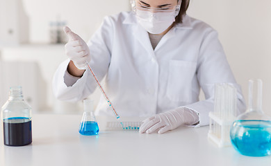 Image showing close up of scientist making test in lab