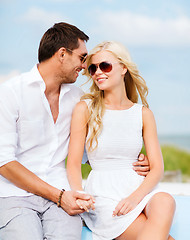 Image showing couple in shades at seaside