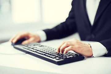 Image showing man hands typing on keyboard