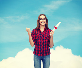 Image showing smiling female student in eyeglasses with diploma