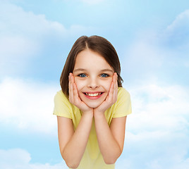 Image showing smiling little girl over white background