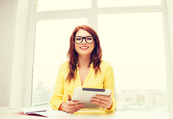 Image showing smiling businesswoman or student with tablet pc