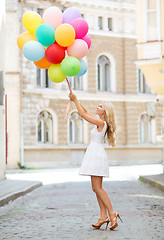 Image showing woman with colorful balloons