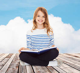 Image showing student girl studying and reading book