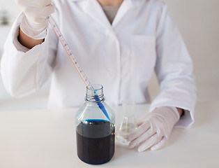 Image showing close up of scientist making test in lab