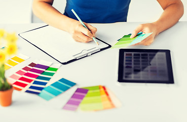 Image showing woman working with color samples for selection