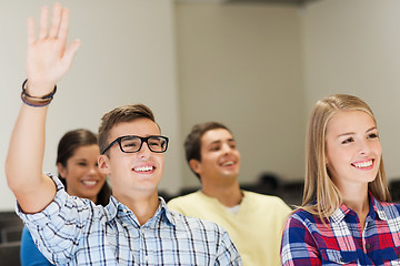 Image showing group of smiling students in lecture hall