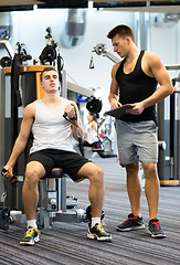 Image showing man exercising on gym machine