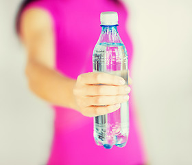 Image showing sporty woman with bottle of water