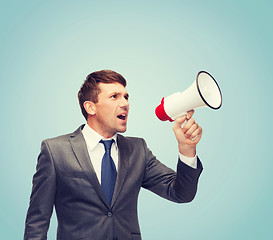 Image showing buisnessman with bullhorn or megaphone