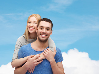 Image showing smiling couple hugging