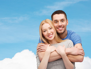 Image showing smiling couple hugging