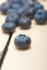 Image showing fresh blueberry on white wood table