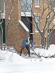 Image showing Person clearing snow