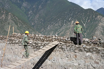 Image showing Chinese people building a wall
