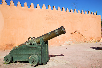 Image showing in africa morocco  green bronze cannon and the blue sky