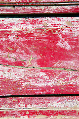 Image showing  paint in the brown wood door and rusty yellow red