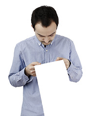 Image showing Man holding a paper