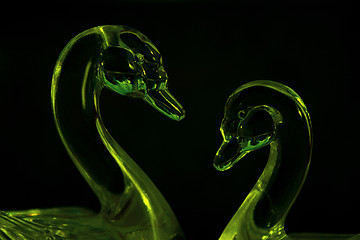 Image showing green glass swans