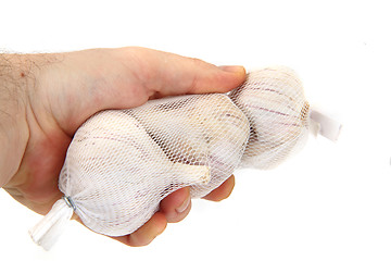 Image showing garlic in the human hand 