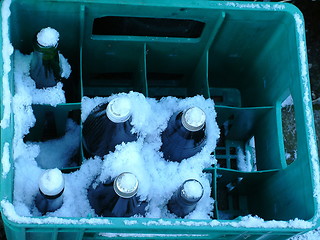 Image showing bottles in the snow