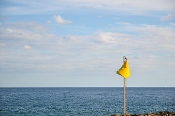 Image showing Yellow warning flag