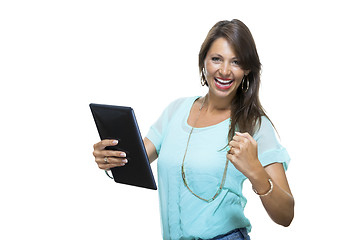 Image showing Pretty Woman Browsing at her Tablet Computer