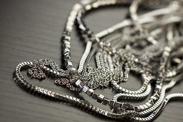 Image showing Pile of assorted silver chains