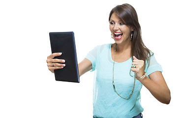 Image showing Pretty Woman Browsing at her Tablet Computer